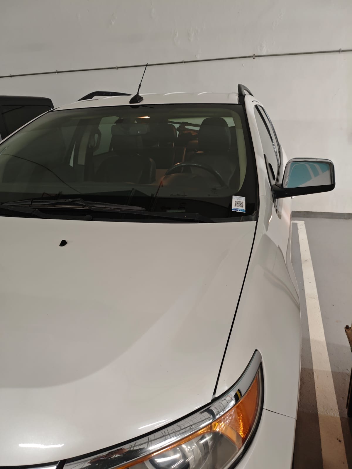iSayara sticker displayed on a founding driver's car